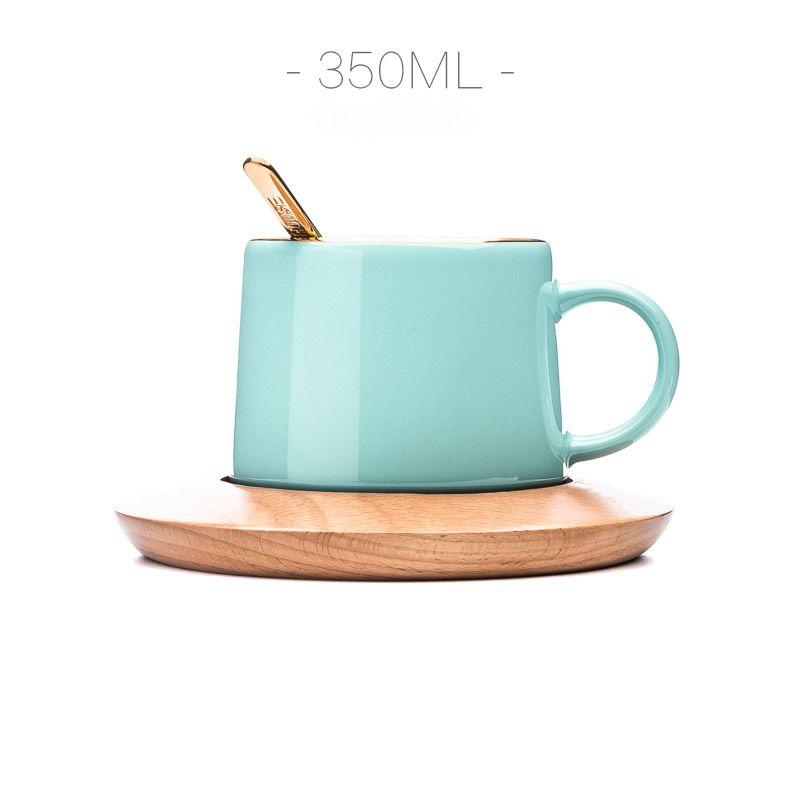 Tách sứ xương phủ bóng, chi tiết viền vàng vẽ tay Kèm đế gỗ D14 350m